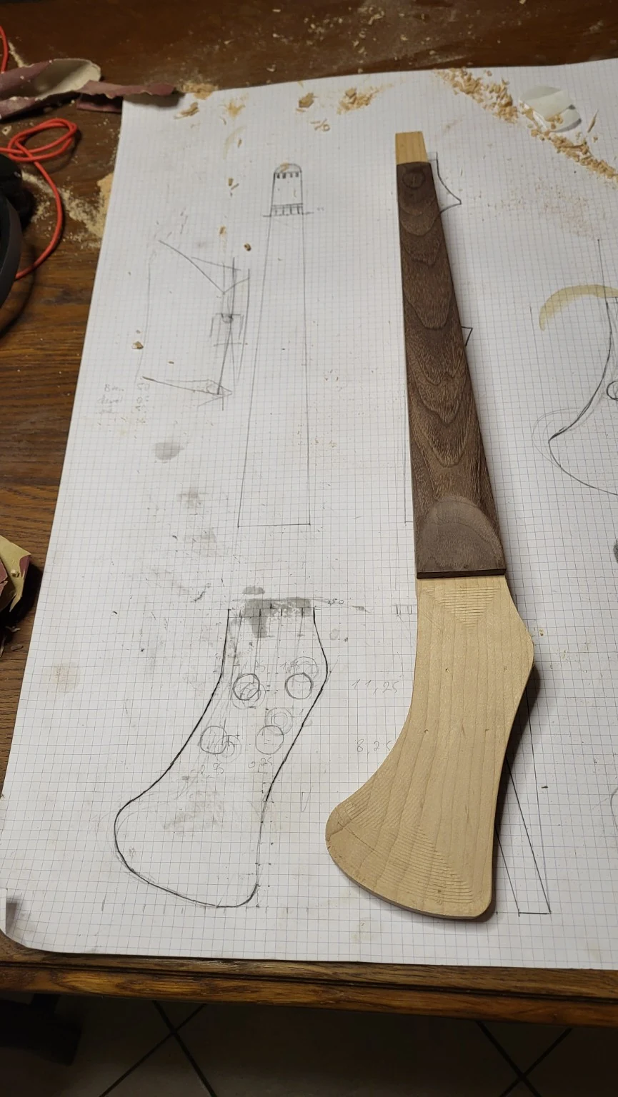 Front view of the semi-finished Koton violin with the fingerboard fitted